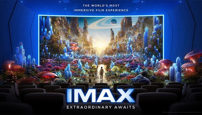 IMAX auditorium with fantastical scene on screen representing more picture